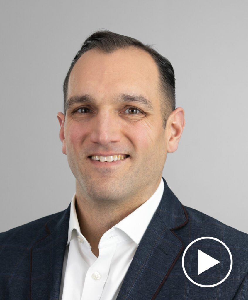 Photo of Nicholas Amicucci with play button