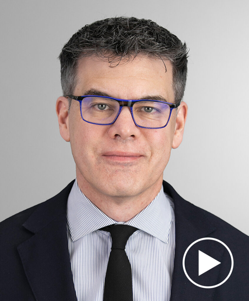 Photo of Michael Binetti with play button