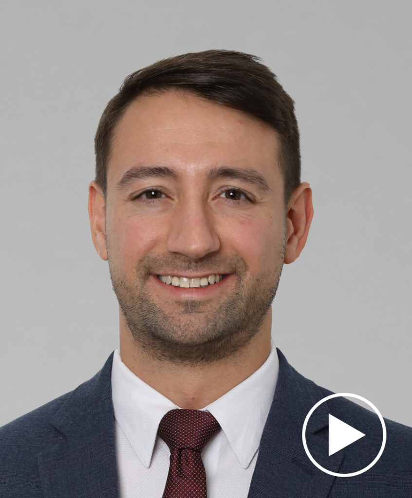 Photo of Gavin Clark-Gartner with play button