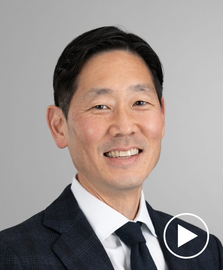 Photo of Stephen Kim with play button