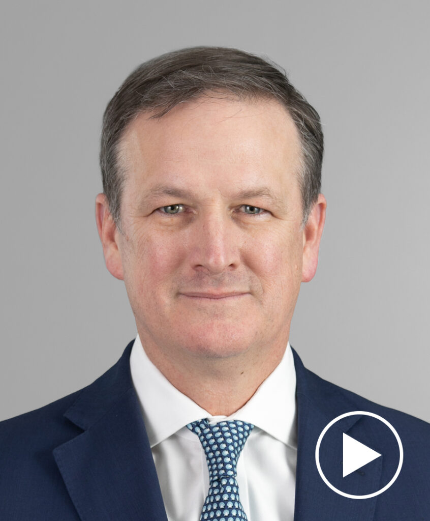 Photo of David Palmer with play button