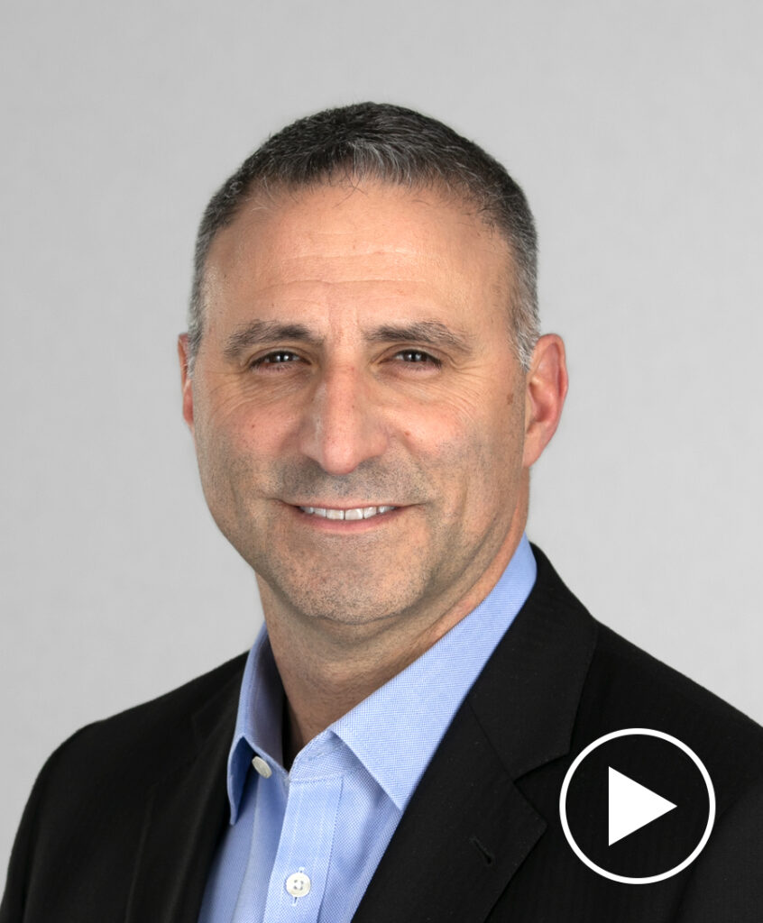 Photo of John Pancari with play button