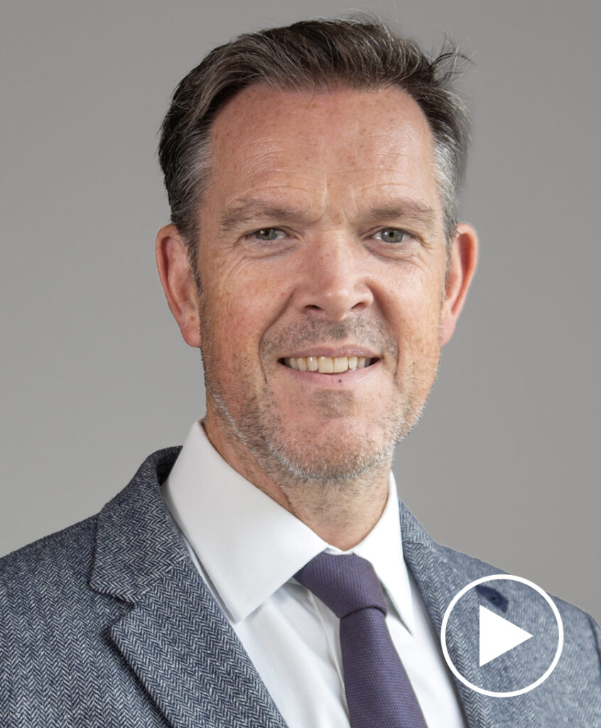 Photo of Alexander Virgo with play button